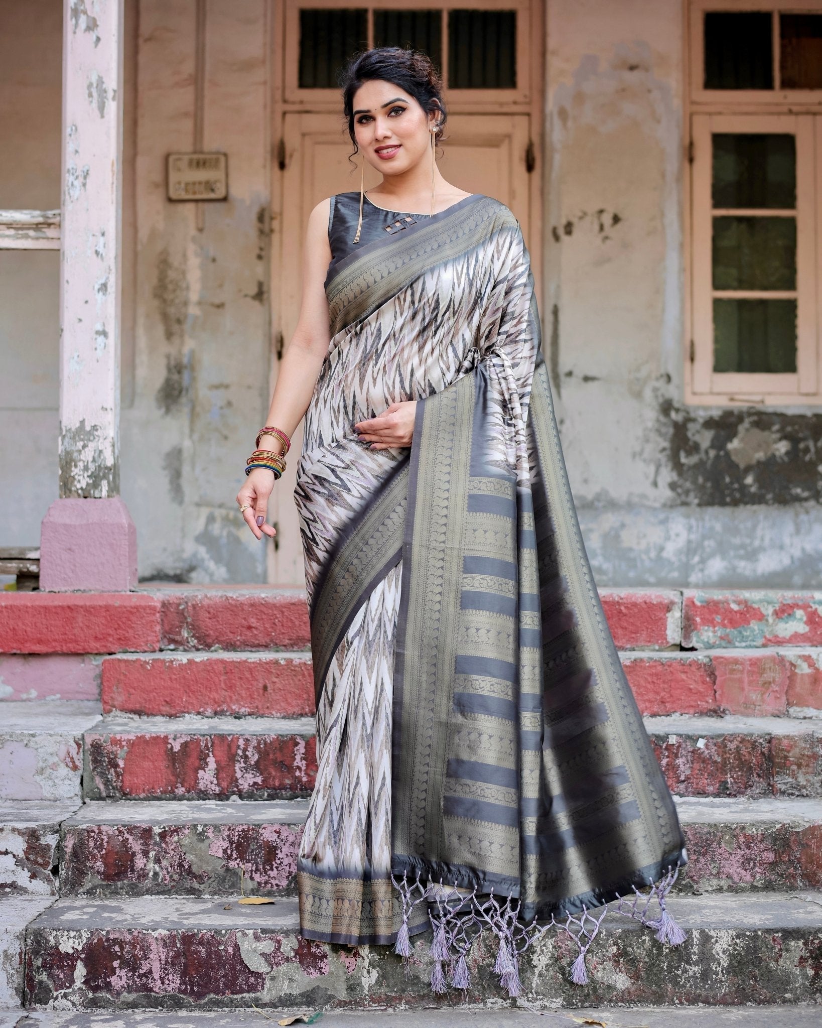 Elegant Banarasi Silk Saree with Zari Weaving and Tassels in Shades of Grey and Black