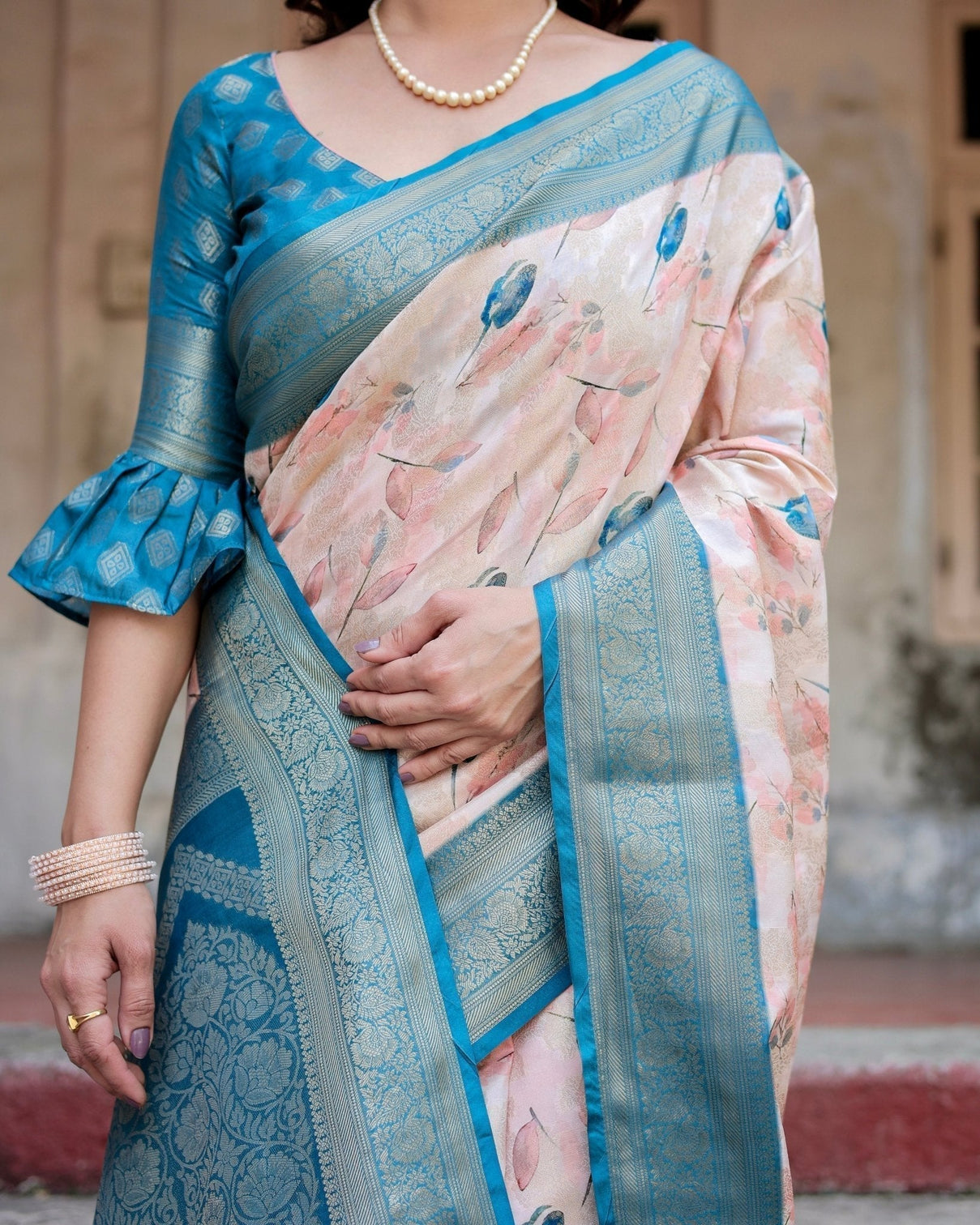Peach and Teal Floral Digital Print Banarasi Silk Saree with Zari Weave and Tassel-Adorned Pallu