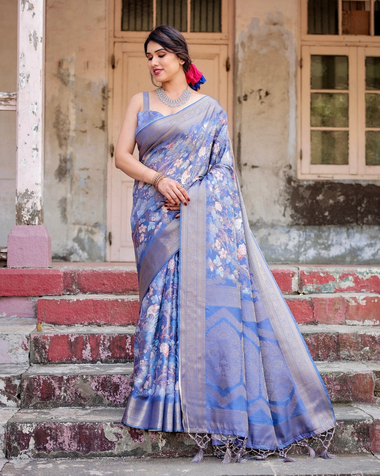 Majestic Blue Banarasi Silk Saree with Delicate Floral Zari Work and Tassel-Embellished Pallu