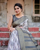 Elegant Banarasi Silk Saree with Zari Weaving and Tassels in Shades of Grey and Black