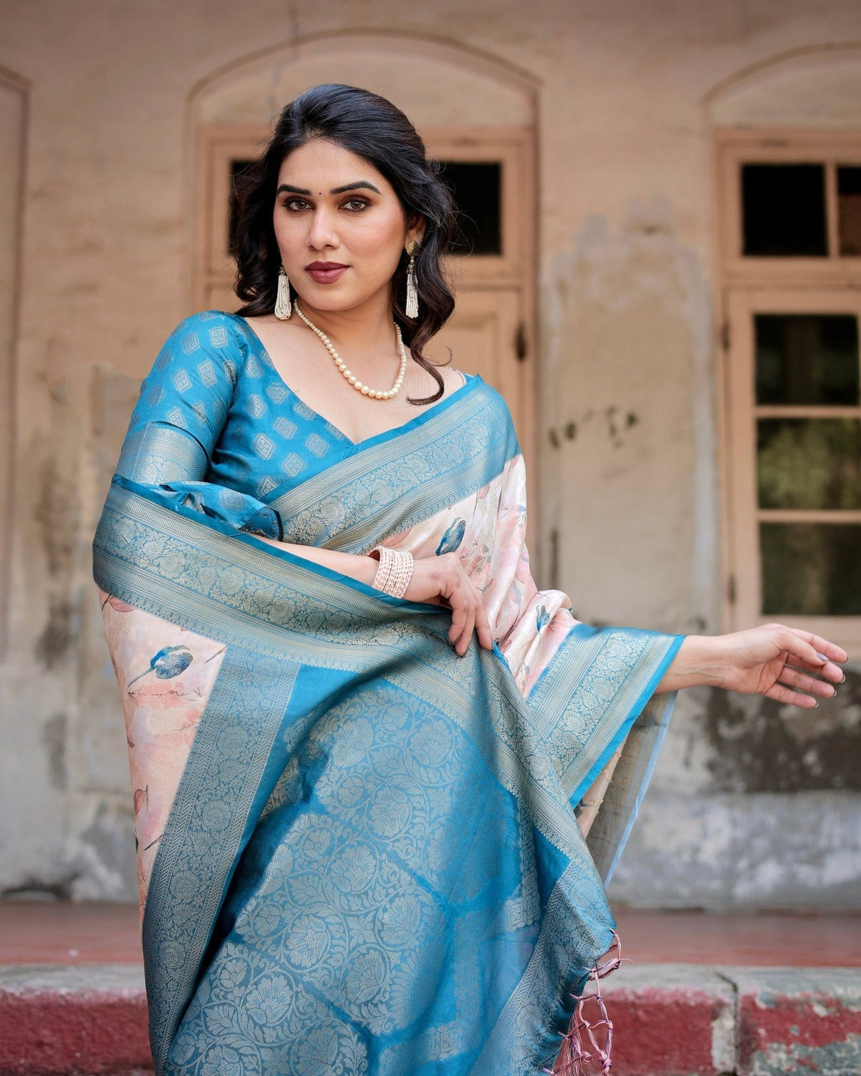 Peach and Teal Floral Digital Print Banarasi Silk Saree with Zari Weave and Tassel-Adorned Pallu