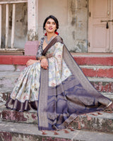 Elegant Gray Banarasi Silk Saree with Navy Blue Zari Weave, Floral Design, and Tassels