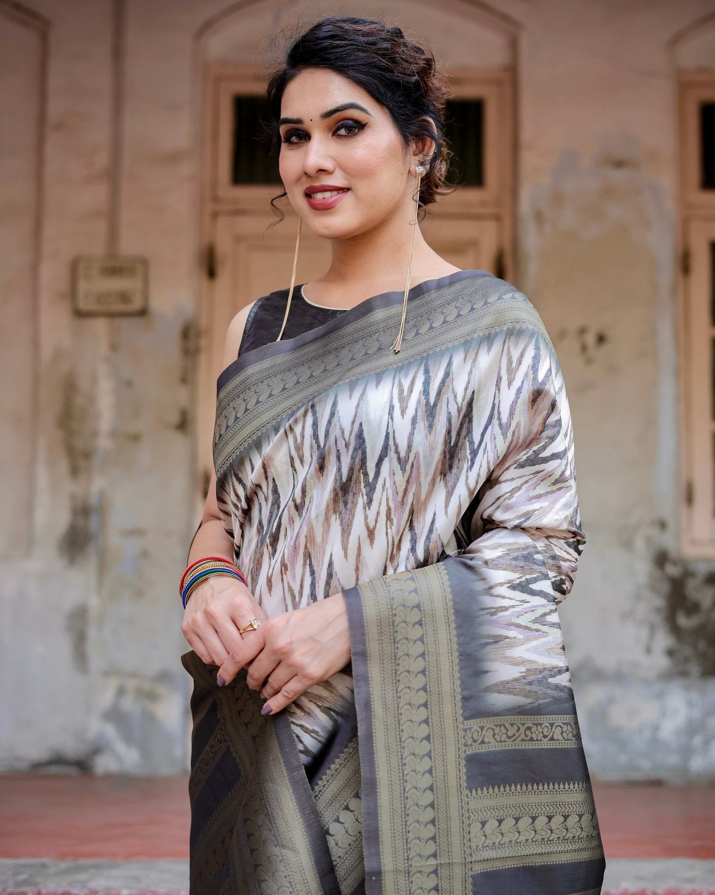 Elegant Banarasi Silk Saree with Zari Weaving and Tassels in Shades of Grey and Black