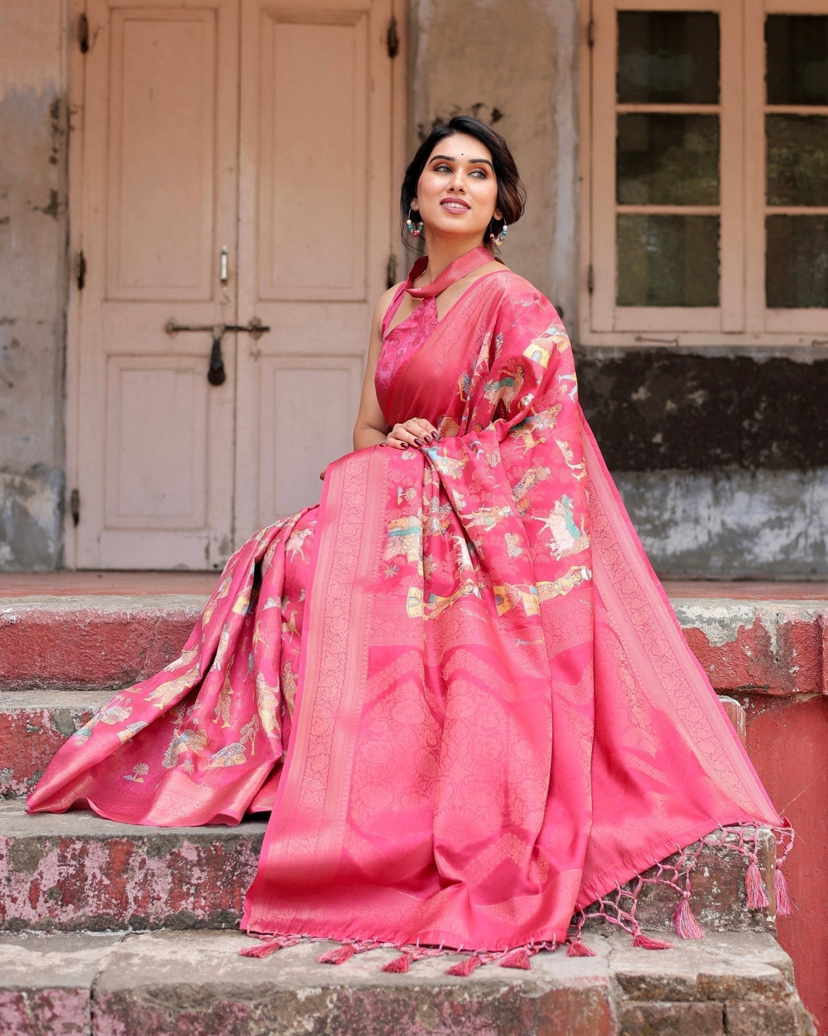 Regal Pink Banarasi Silk Saree with Zari Weave and Intricate Tassels