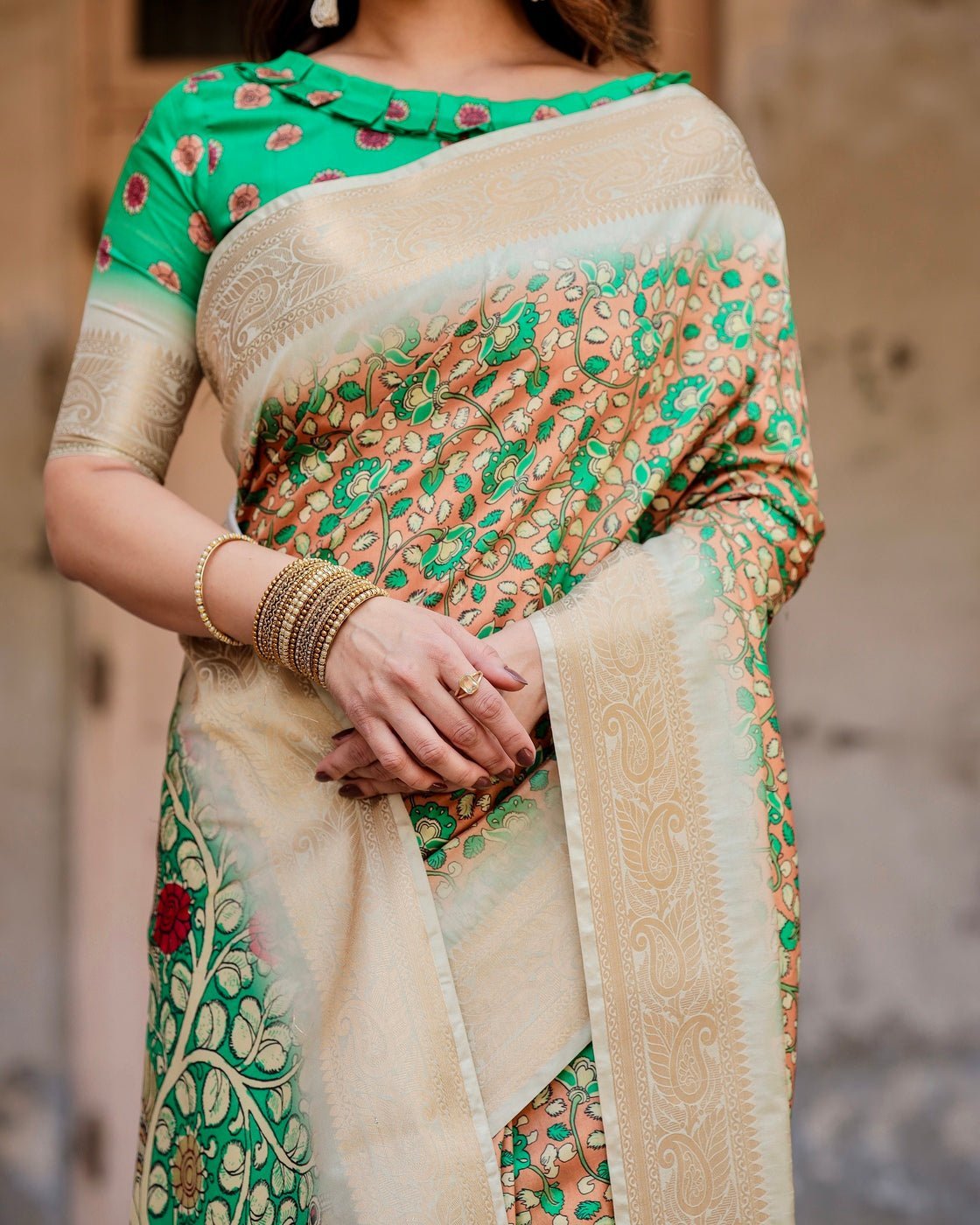 Emerald Green and Gold Tussar Silk Saree with Floral and Ornamental Motifs