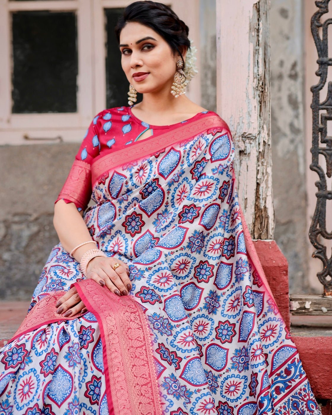 White and Red Tussar Silk Saree with Vibrant Floral Geometric Motifs and Ornamental Zari Border