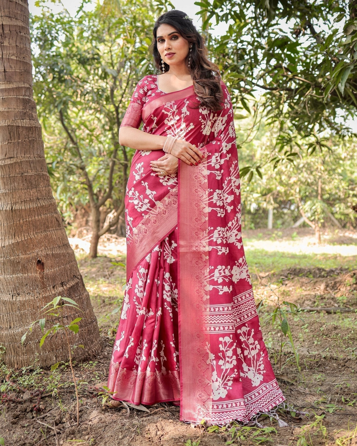 Maroon Tussar Silk Saree with White Floral Motifs, Intricate Zari Border, and Elegant Tassel Pallu