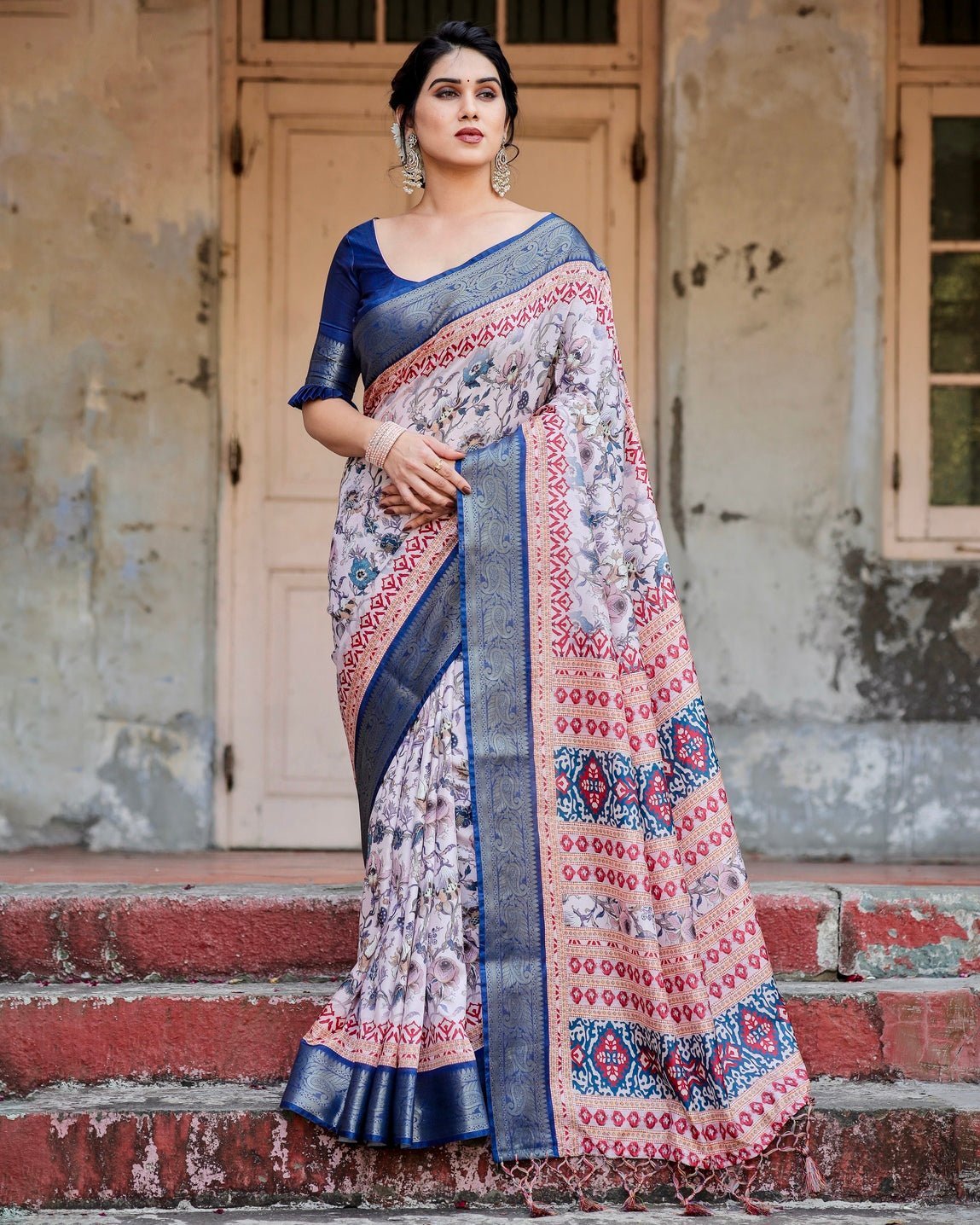 Ivory and Navy Blue Tussar Silk Saree with Floral Elegance and Ornamental Zari Work