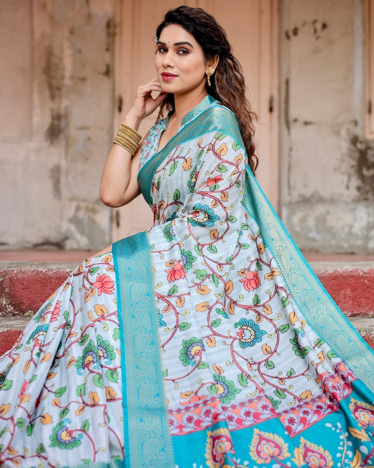 Sky Blue Tussar Silk Saree with Multicolor Floral Design and Zari Paisley Border