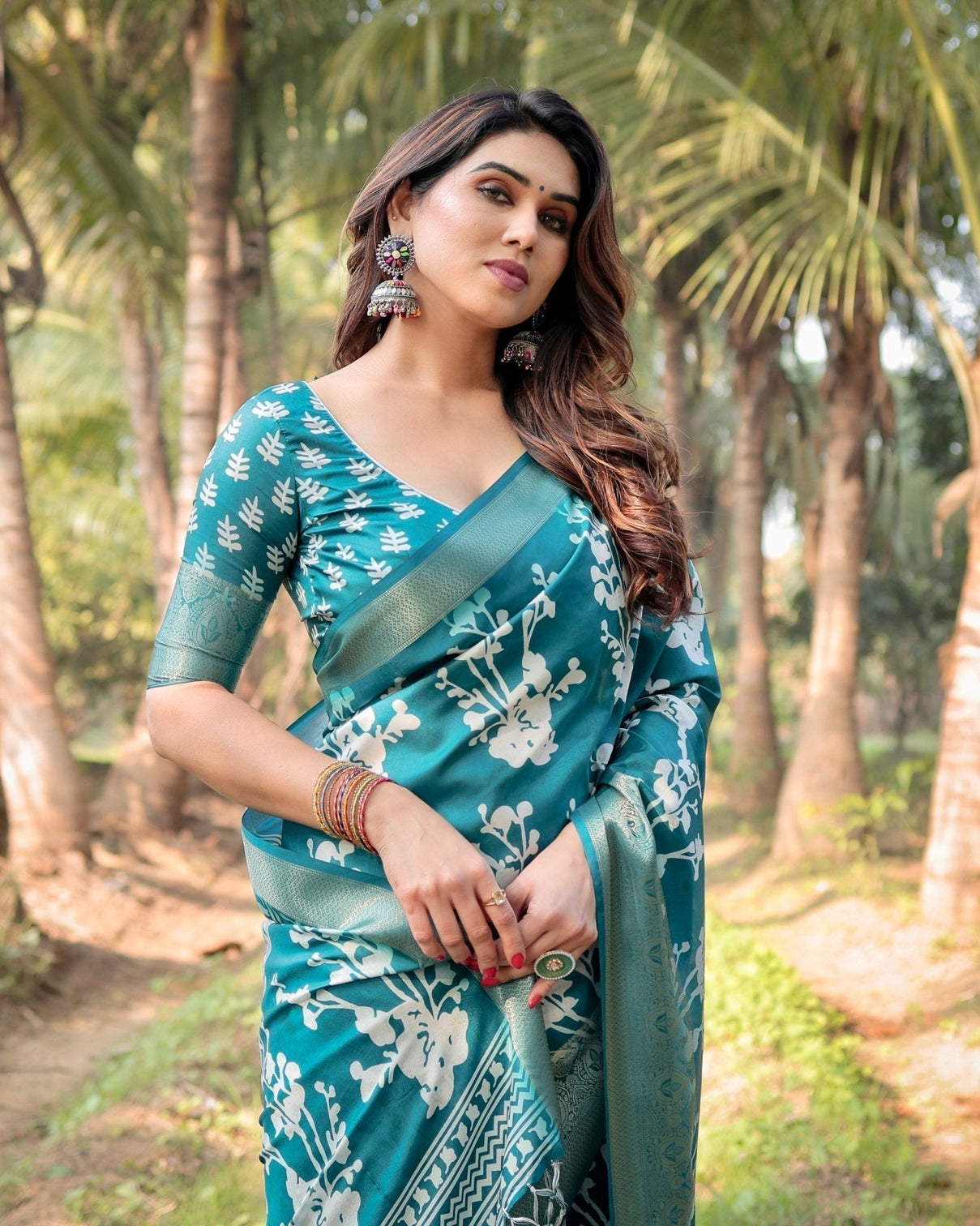 Teal Blue Tussar Silk Saree with White Floral Design, Gold Zari Border & Tassel Pallu
