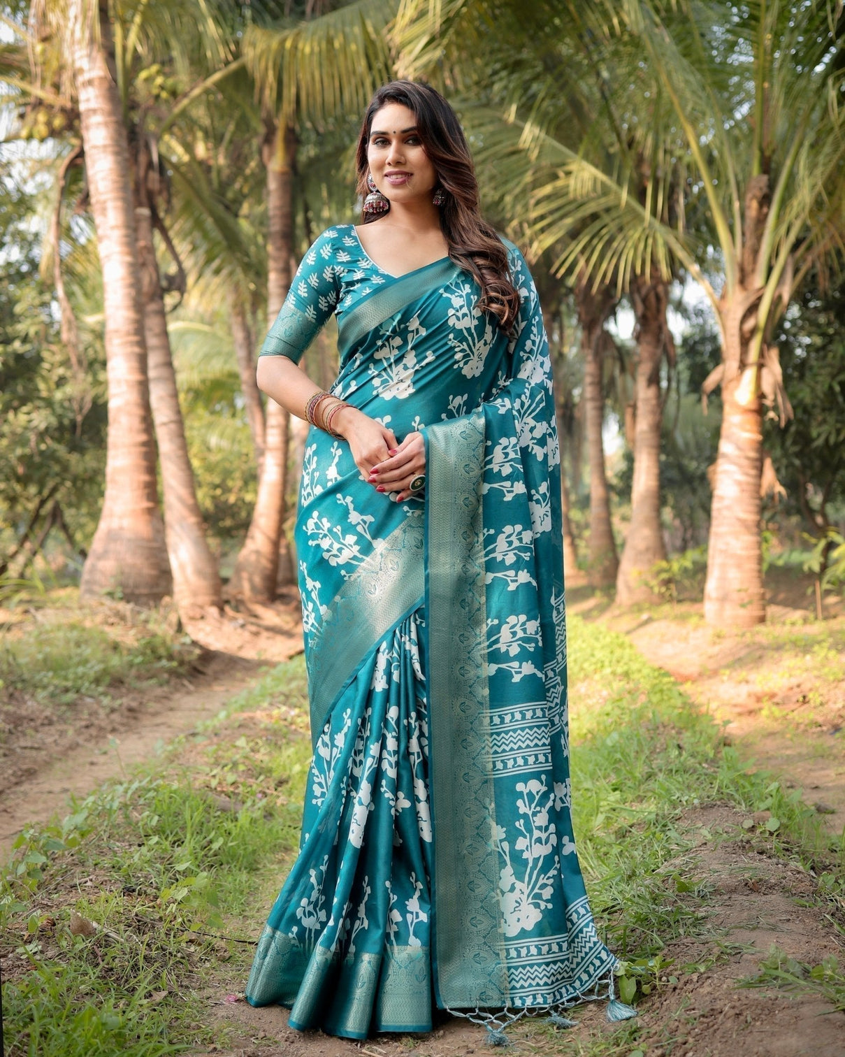 Teal Blue Tussar Silk Saree with White Floral Design, Gold Zari Border & Tassel Pallu
