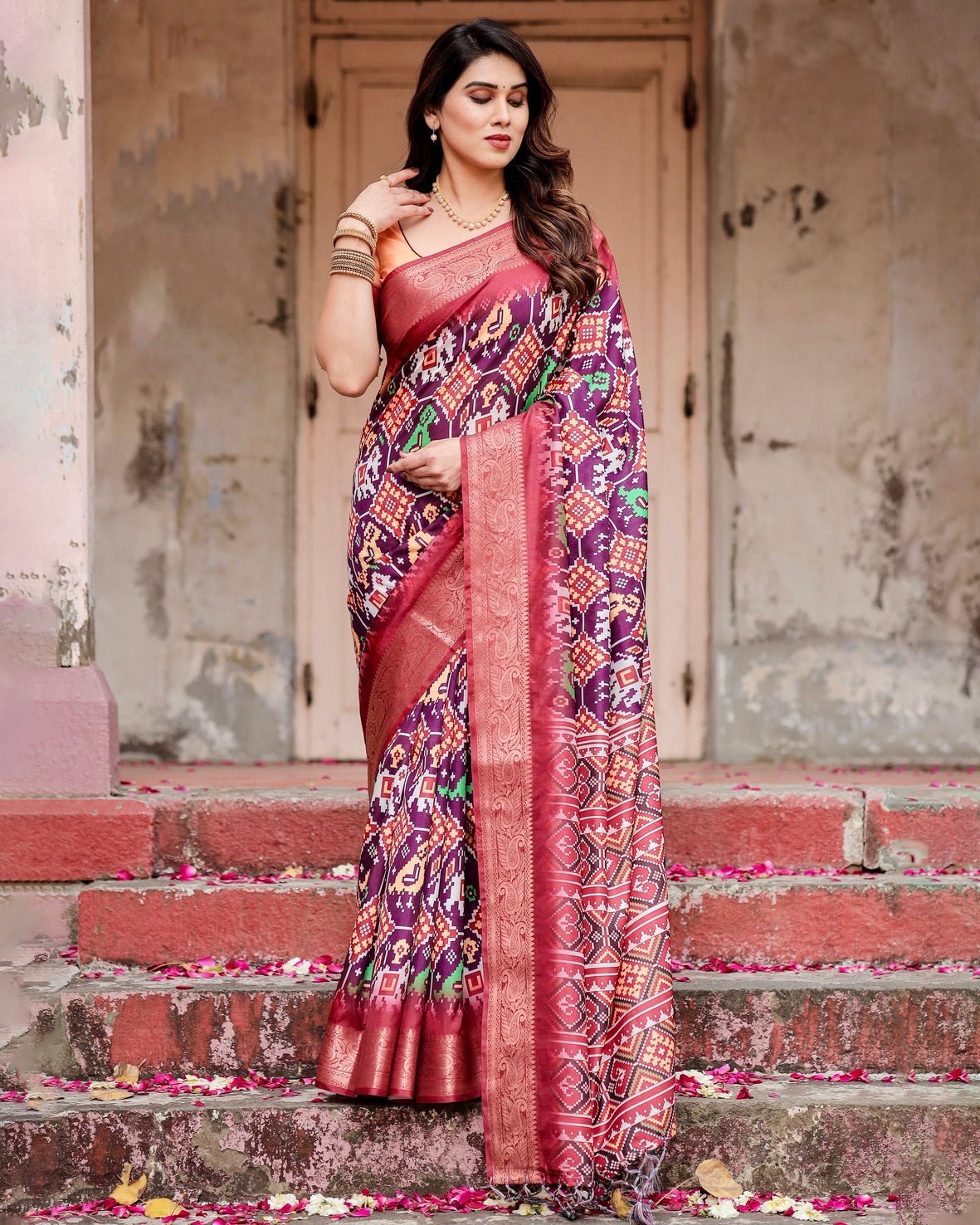 Wine Purple Tussar Silk Saree with Ikat-Inspired Patterns and Rich Zari Border
