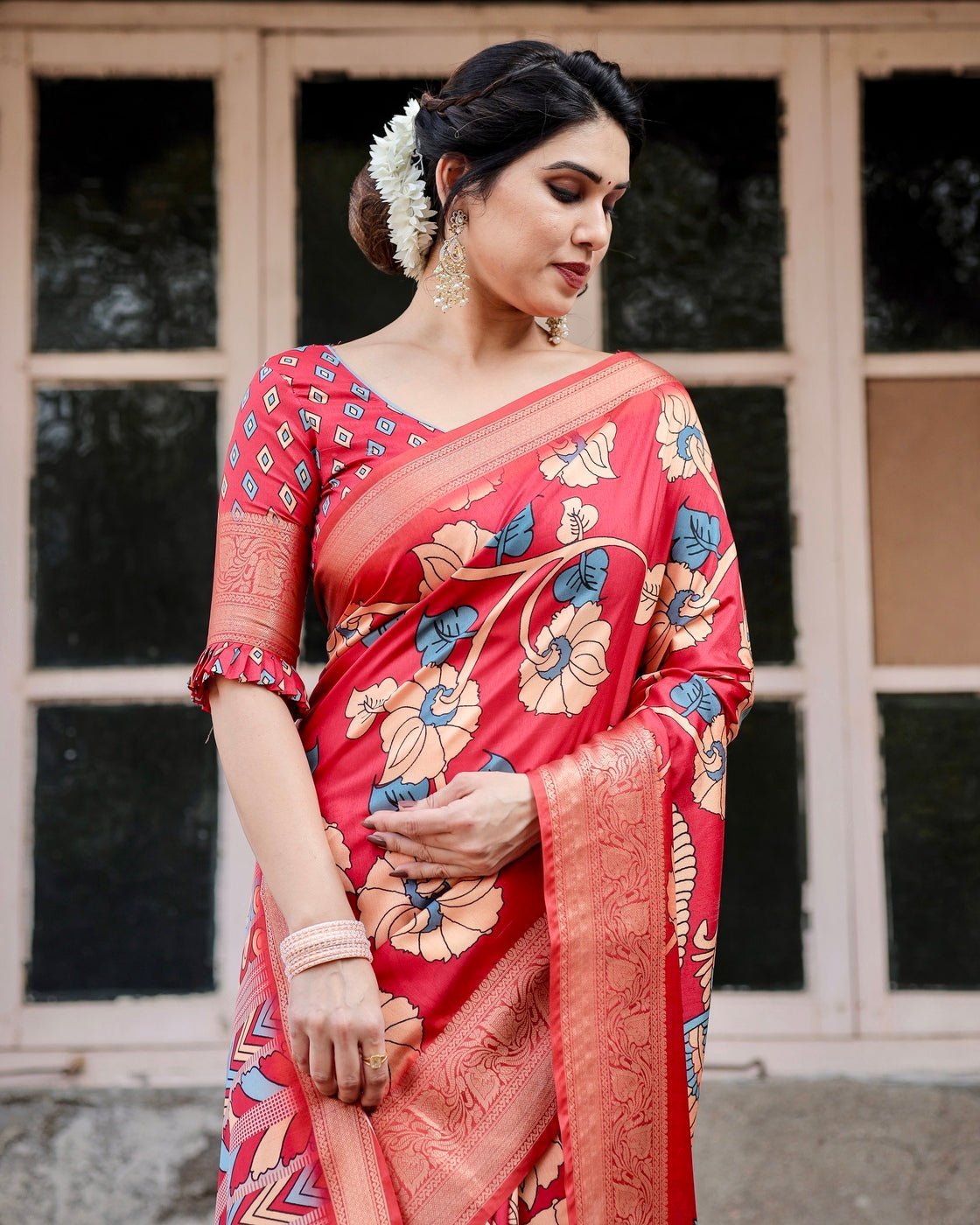 Vibrant Red Tussar Silk Saree with Bold Floral Motifs and Chevron Patterned Pallu