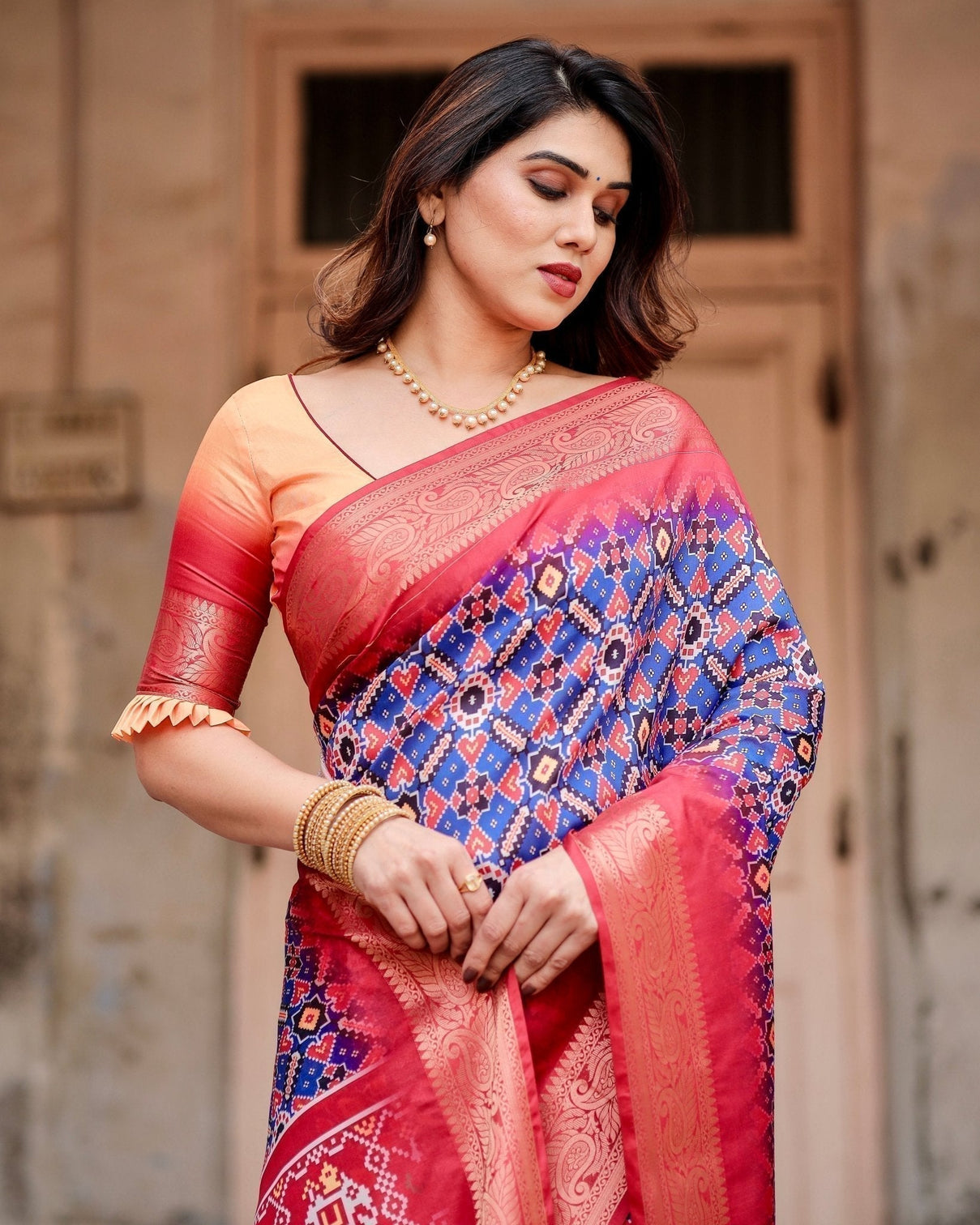 Royal Blue and Red Tussar Silk Saree with Geometric Patterns and Ornate Zari Border