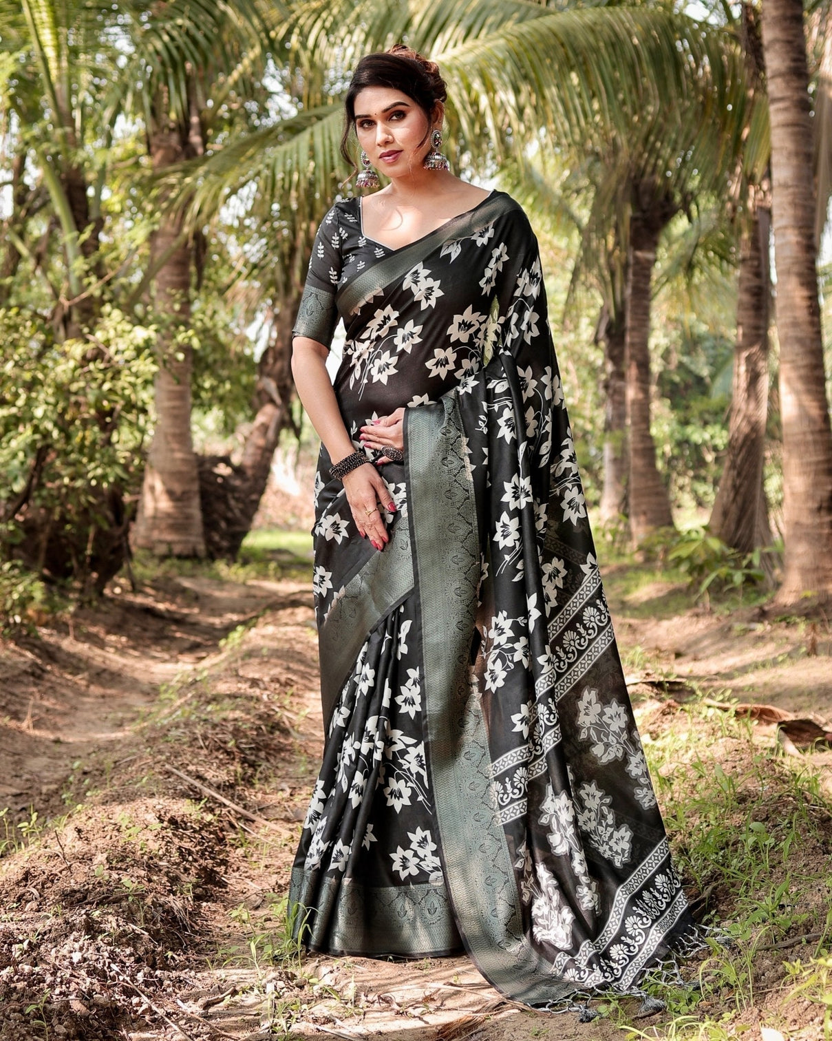 Elegant Black Tussar Silk Saree with Zari Embellished Border and Bold Floral Pallu