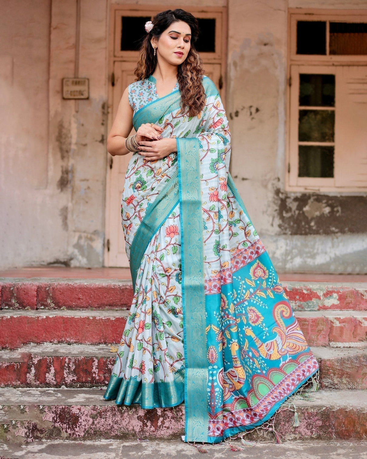 Sky Blue Tussar Silk Saree with Multicolor Floral Design and Zari Paisley Border