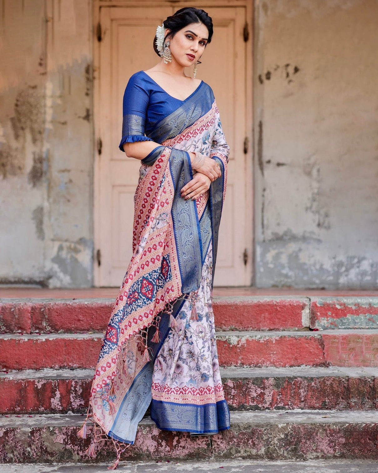 Ivory and Navy Blue Tussar Silk Saree with Floral Elegance and Ornamental Zari Work