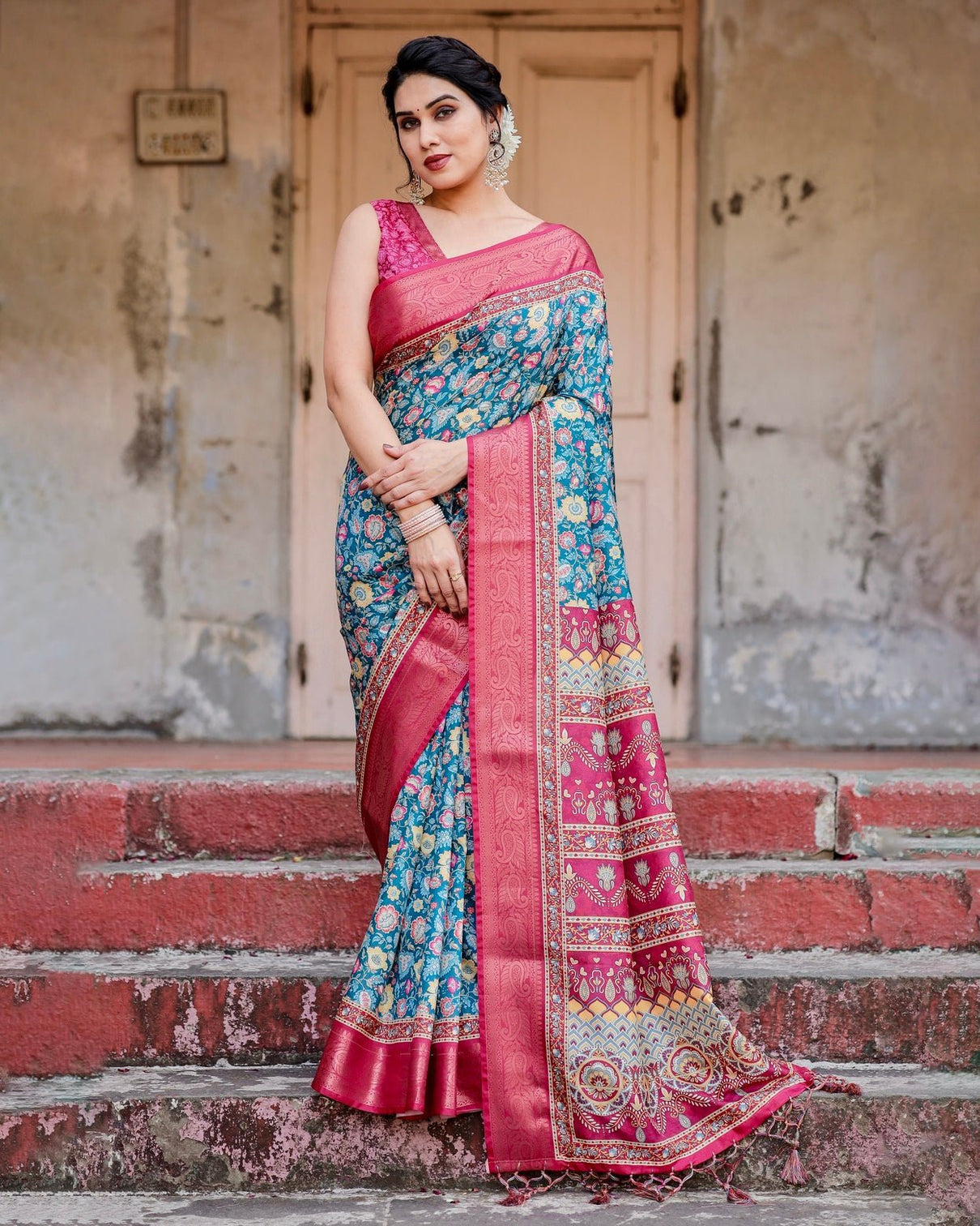 Teal Blue and Coral Tussar Silk Saree with Vibrant Floral Motifs and Ornamental Pallu