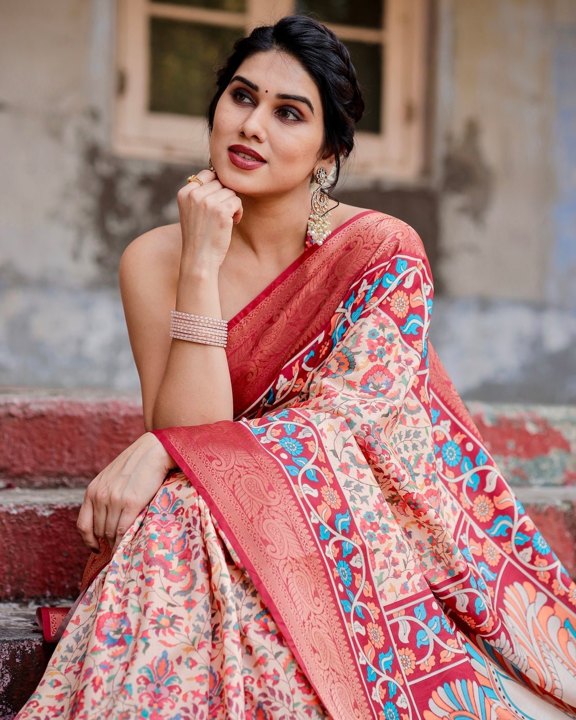 Beige and Coral Tussar Silk Saree with Intricate Floral Prints and Artistic Pallu