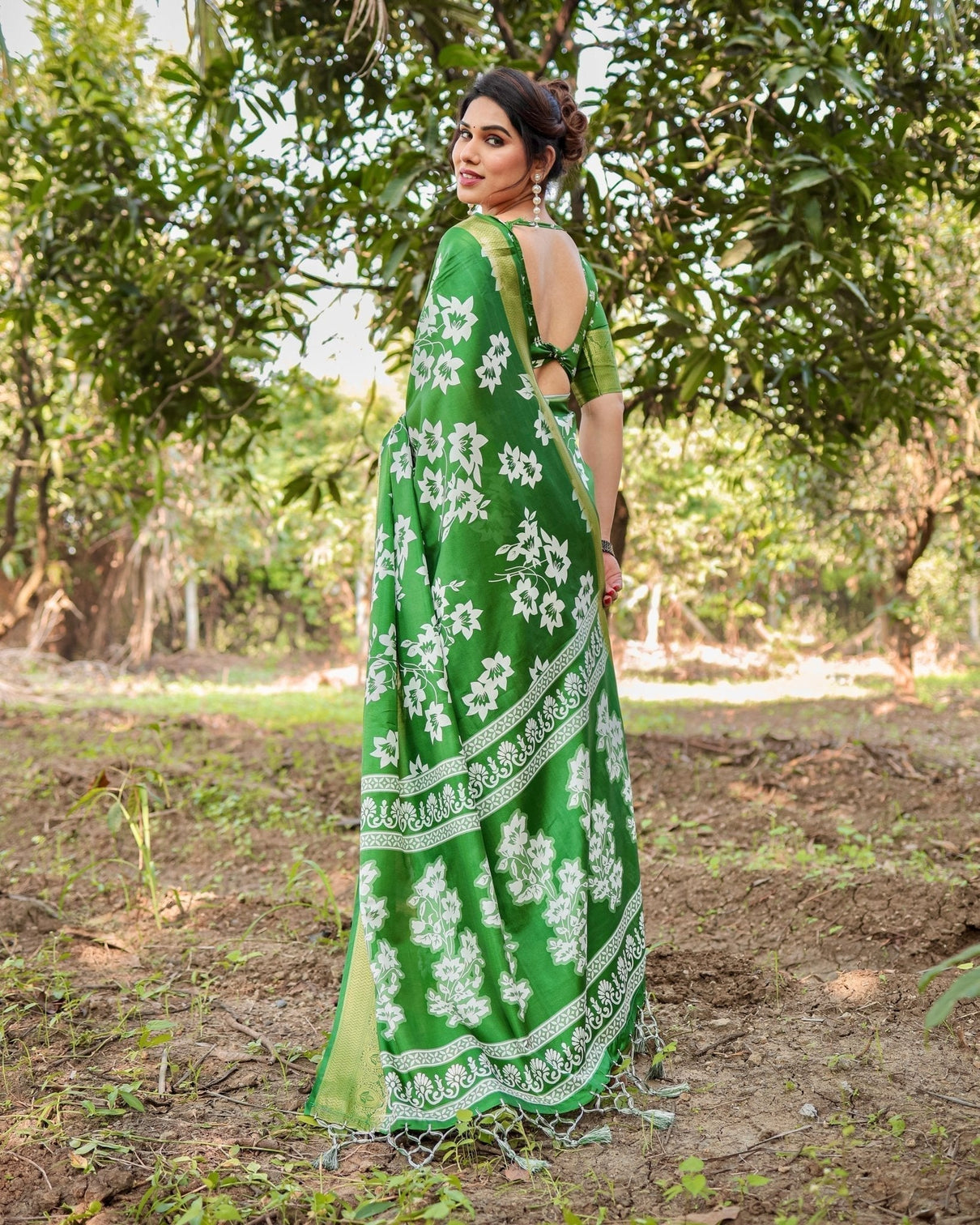 Enchanting Green Tussar Silk Saree with White Floral Prints and Zari Border