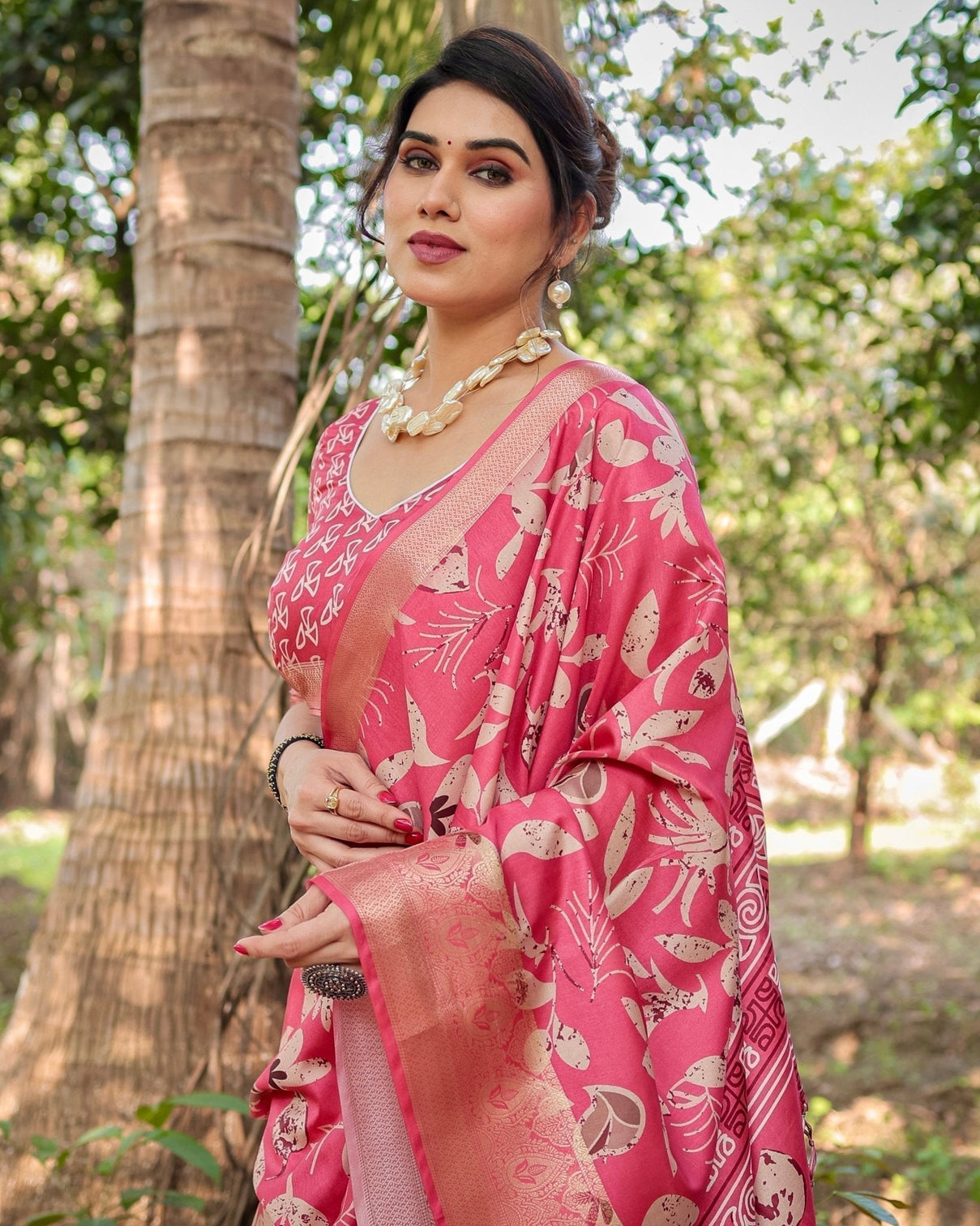 Vibrant Pink Tussar Silk Saree with Intricate Zari Border and Modern Floral Pallu