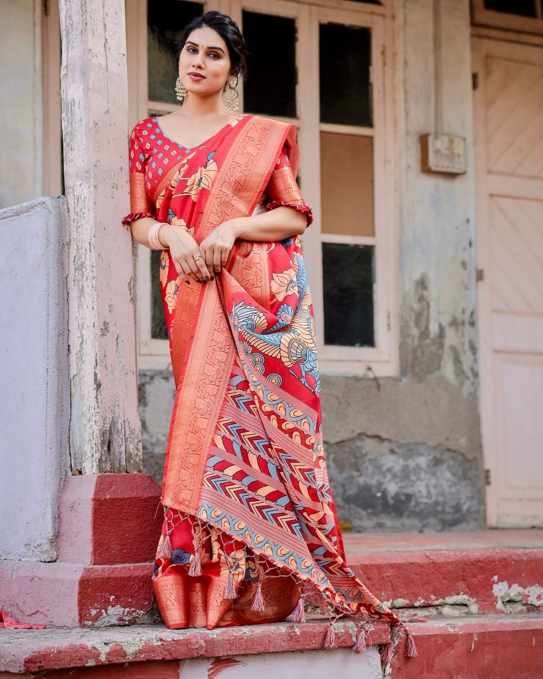 Vibrant Red Tussar Silk Saree with Bold Floral Motifs and Chevron Patterned Pallu