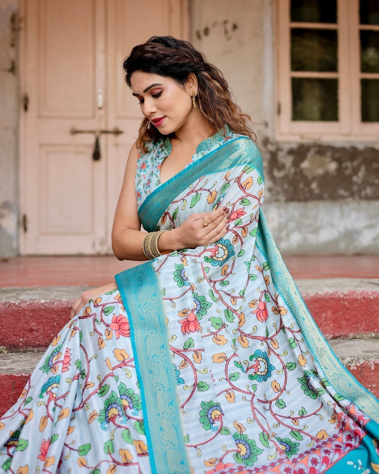 Sky Blue Tussar Silk Saree with Multicolor Floral Design and Zari Paisley Border