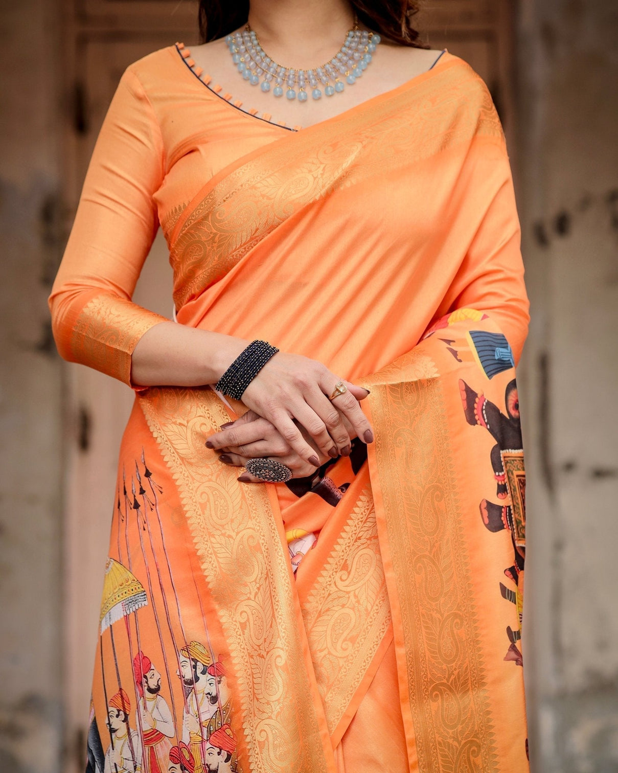 Sunset Orange Tussar Silk Saree with Royal Procession Pallu and Zari Border
