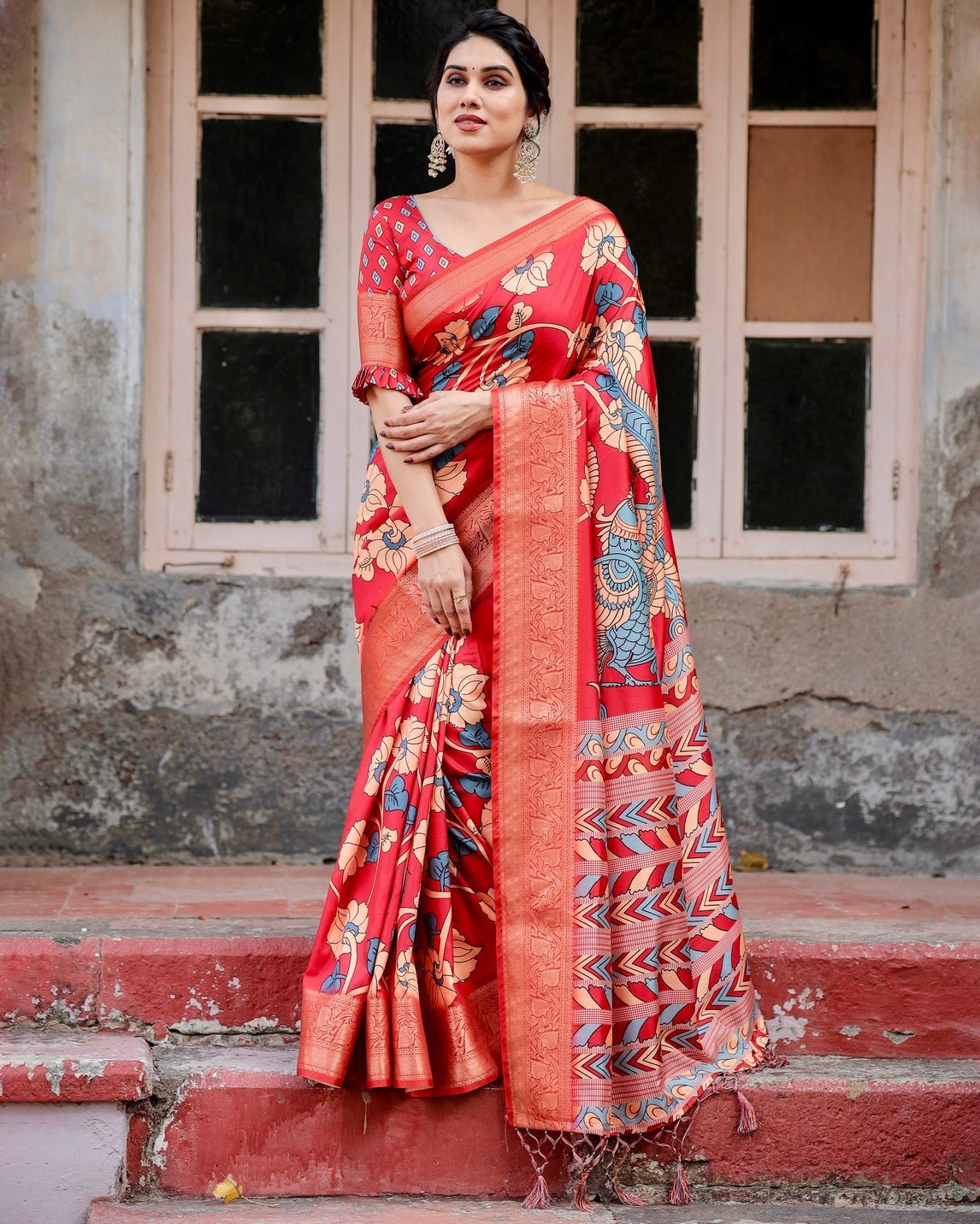 Vibrant Red Tussar Silk Saree with Bold Floral Motifs and Chevron Patterned Pallu