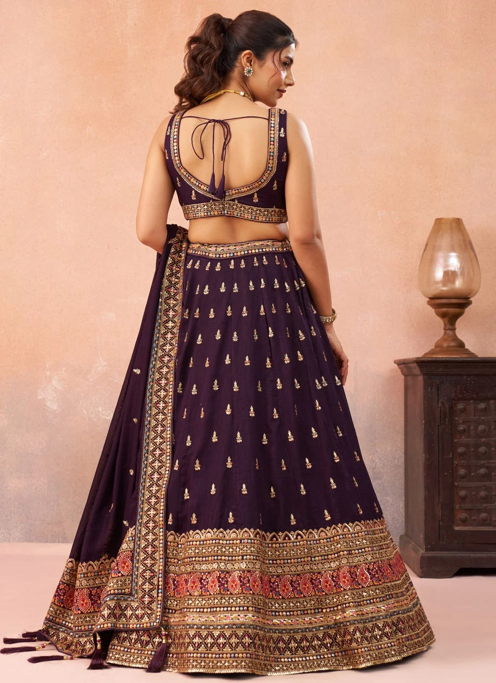 Purple chinnon silk lehenga with zari embroidery for wedding functions