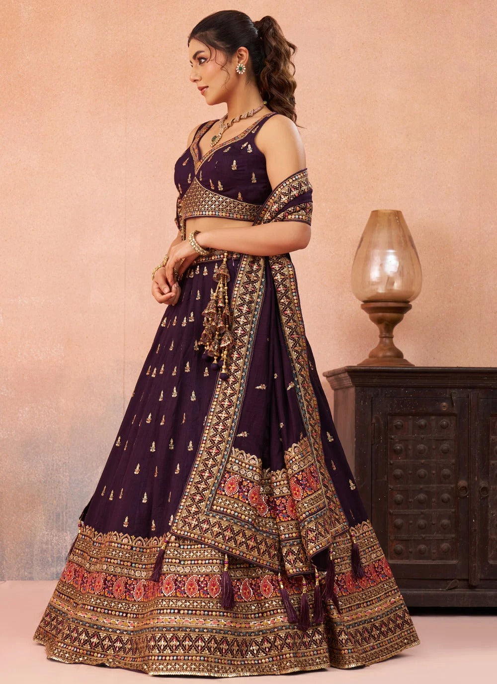 Purple chinnon silk lehenga with zari embroidery for wedding functions
