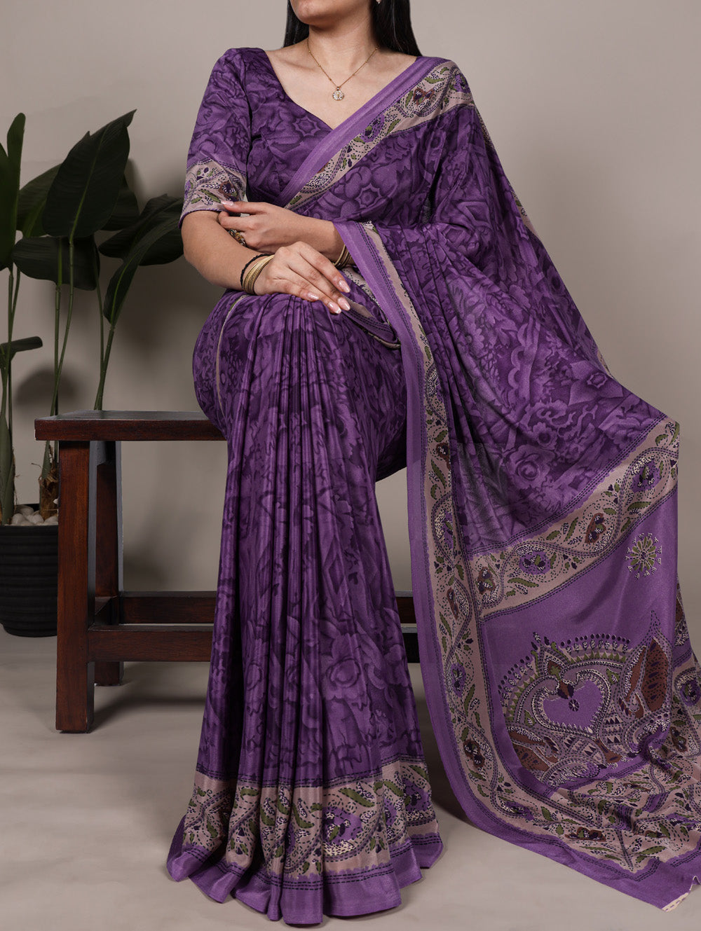 Purple crepe saree with all over print matching blouse