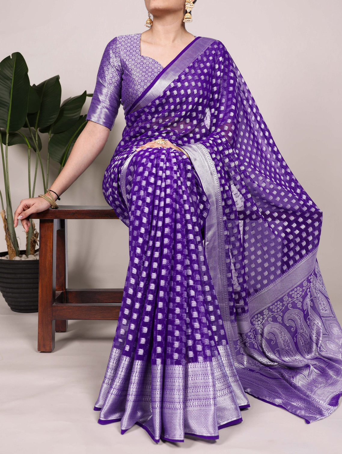 Purple Elegant Nylon Georgette Saree with Zari Weaving & Viscose Border