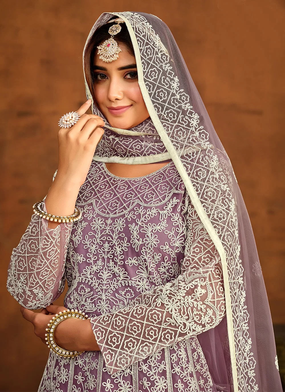Purple embroidered net anarkali dress