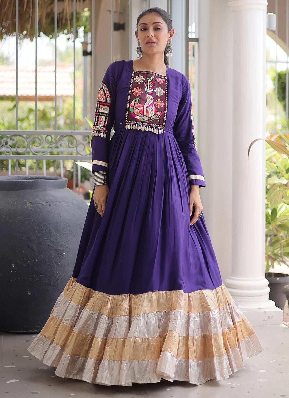 Purple navratri gown with kutchi gamthi work and 12 meter flair