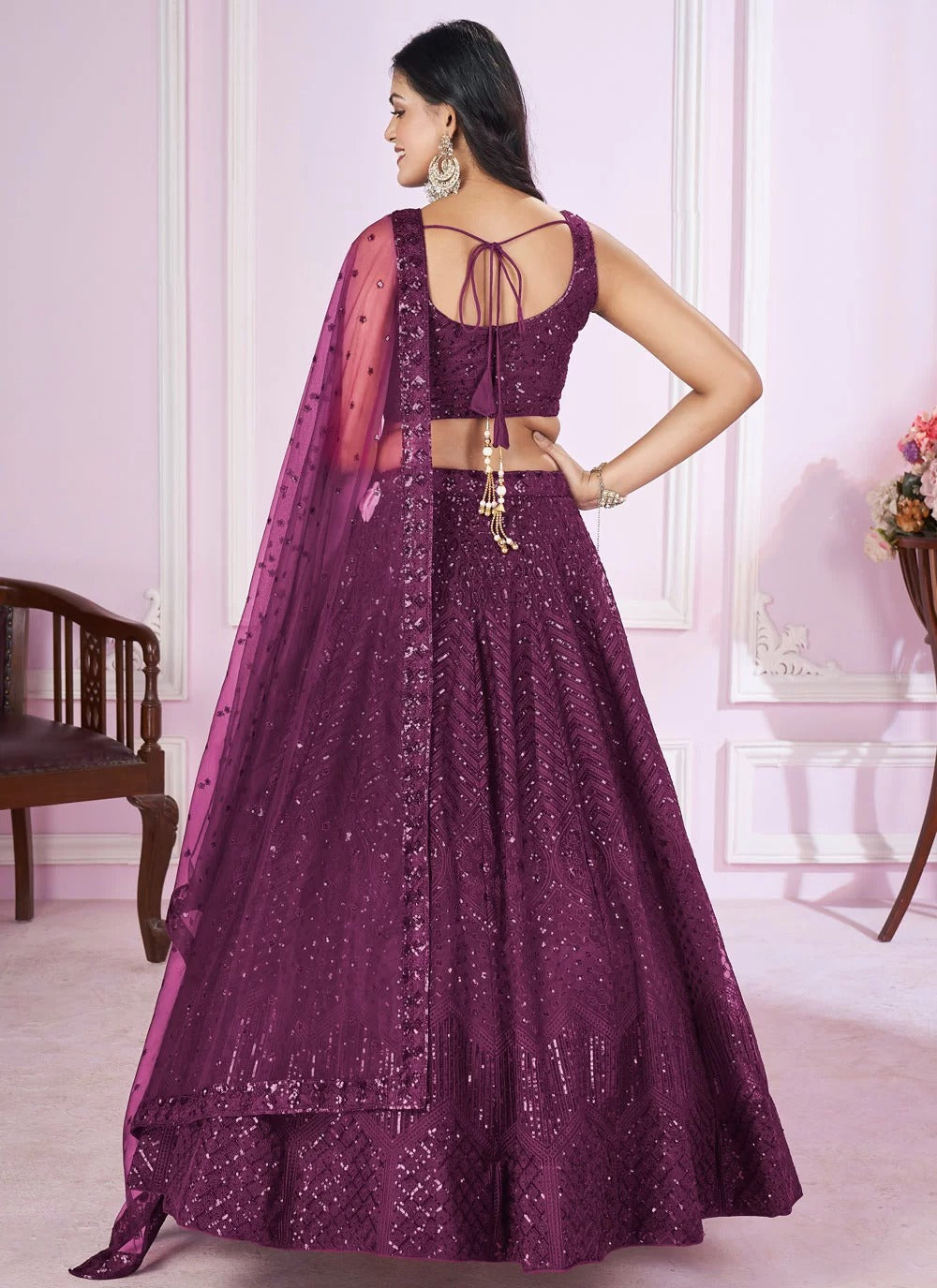 Elegant purple soft net engagement lehenga with sequins embroidery work