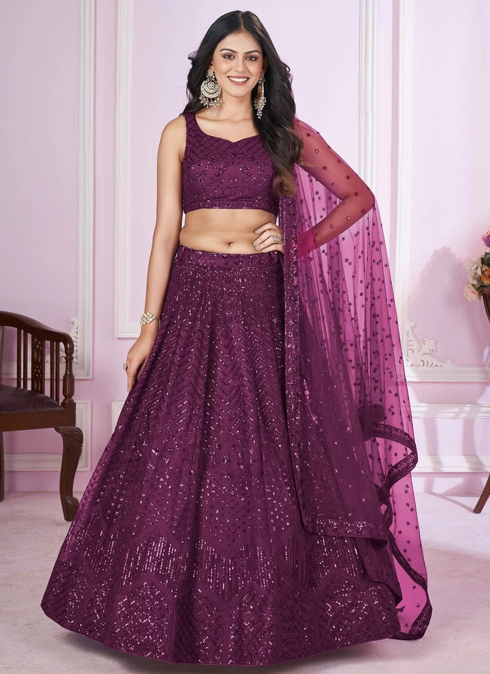 Elegant purple soft net engagement lehenga with sequins embroidery work