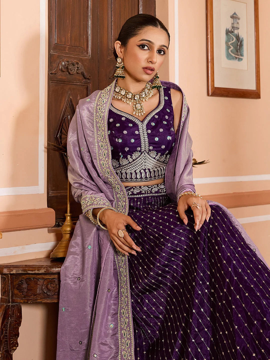 Royal purple engagement lehenga in tissue silk with zari sequins embroidery