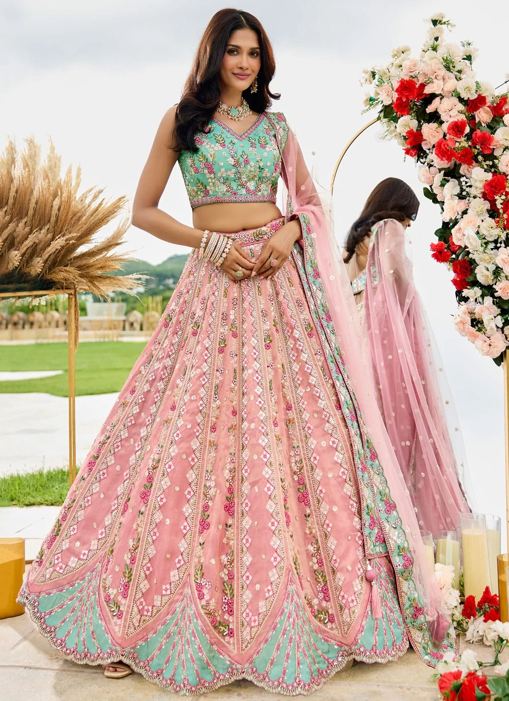 Radiant pink tissue bridesmaid lehenga with sequin work