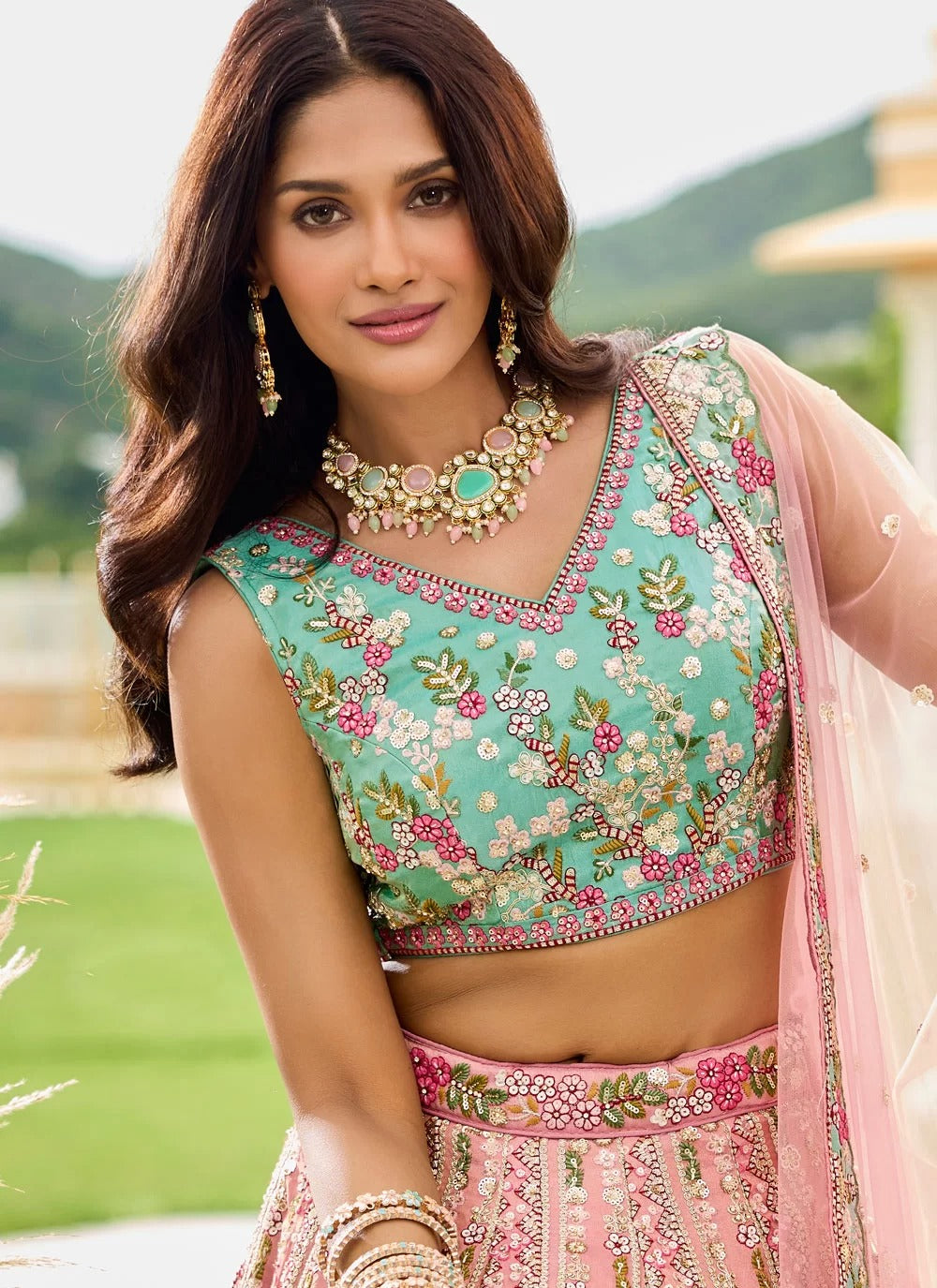 Radiant pink tissue bridesmaid lehenga with sequin work