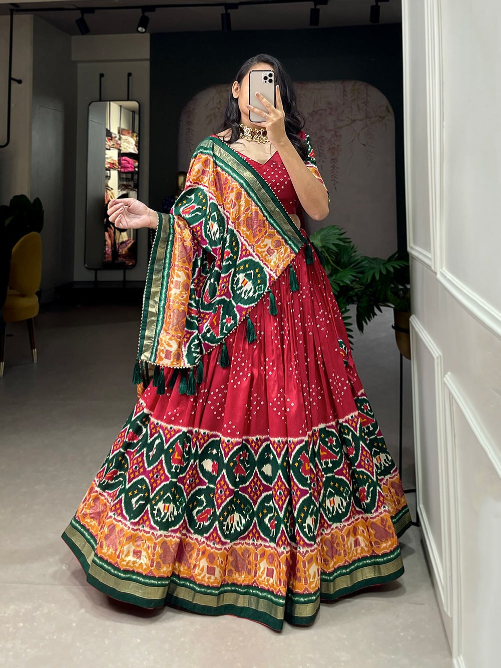 Radiant Red Tussar Silk Lehenga Choli with Enchanting Patola Print & Foil Work