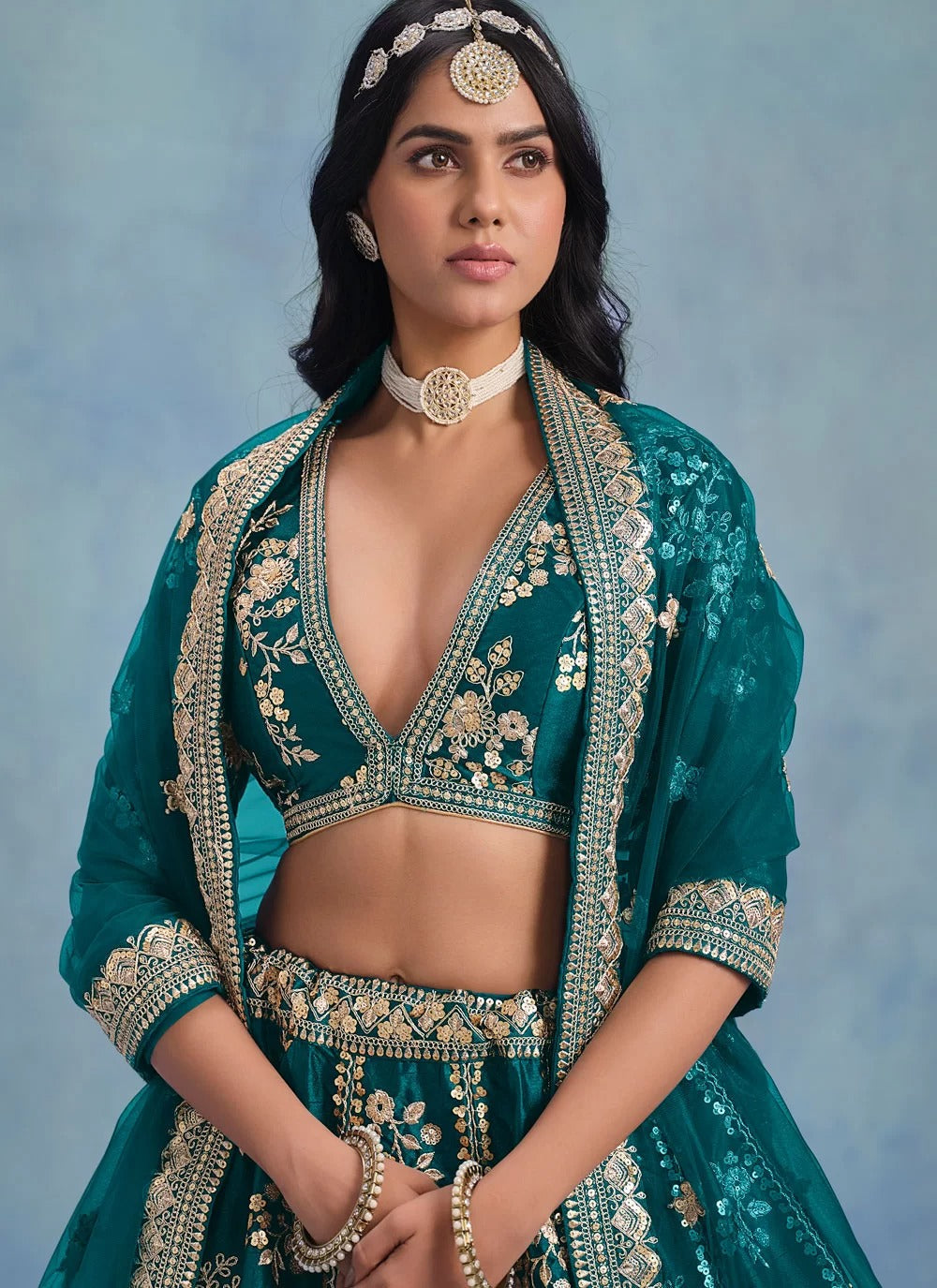 Elegant rama art silk embroidered wedding wear lehenga with net dupatta