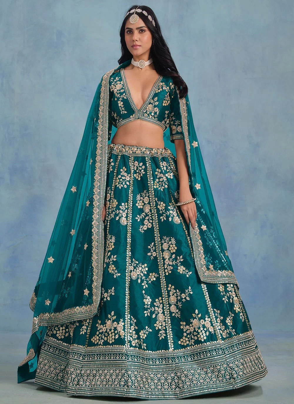 Elegant rama art silk embroidered wedding wear lehenga with net dupatta