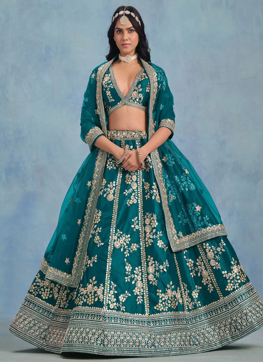 Elegant rama art silk embroidered wedding wear lehenga with net dupatta