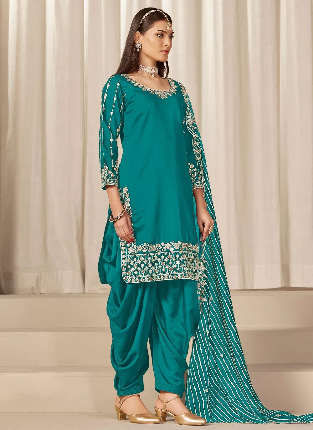 Radiant rama chanderi silk punjabi suit with mirror embroidery