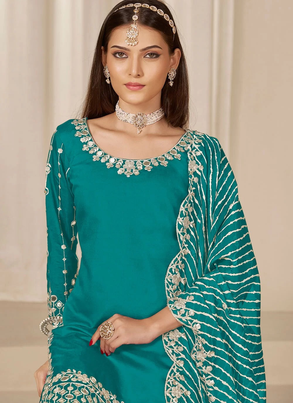 Radiant rama chanderi silk punjabi suit with mirror embroidery