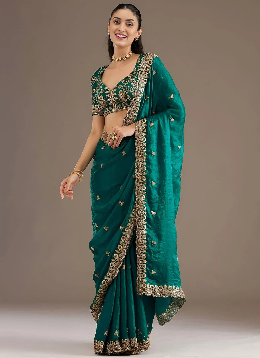 Graceful rama green designer tissue silk saree with zari dori diamond embroidery