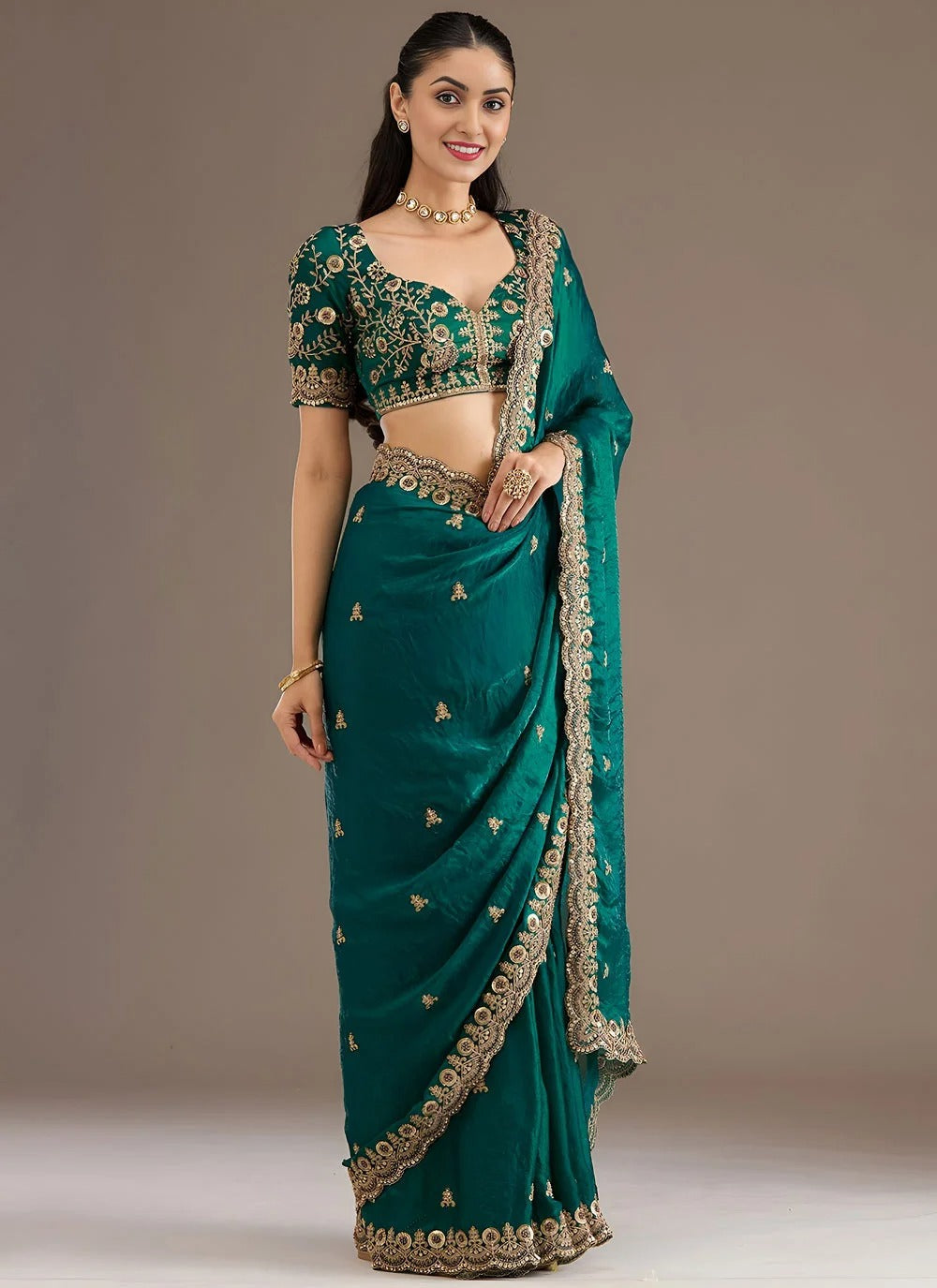 Graceful rama green designer tissue silk saree with zari dori diamond embroidery
