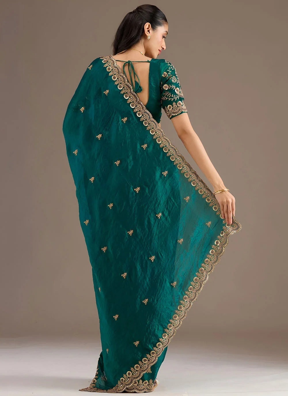 Graceful rama green designer tissue silk saree with zari dori diamond embroidery