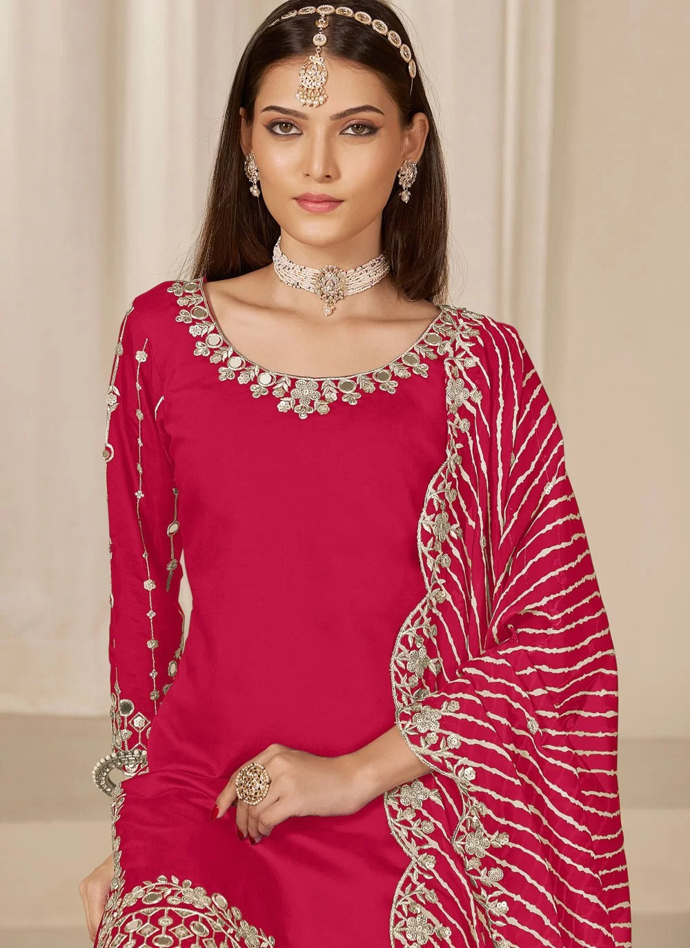 Vibrant rani chanderi silk patiala suit with mirror embroidery